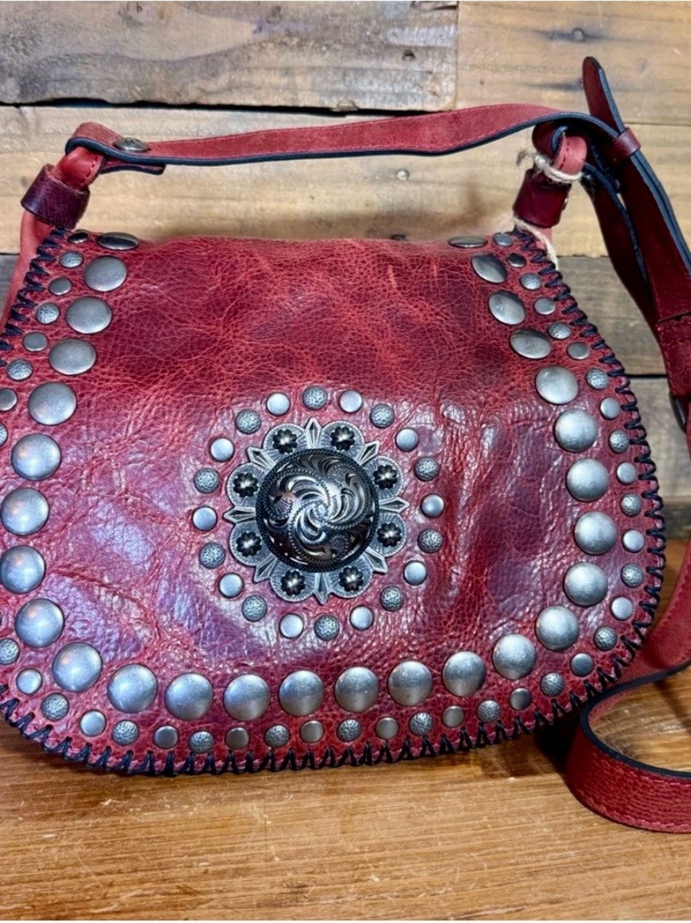 Patricia Nash Madallon Red Leather crossbody with Stud and Concho Detail